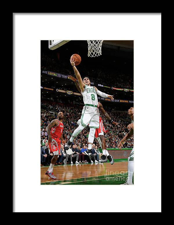 Nba Pro Basketball Framed Print featuring the photograph Shane Larkin by Brian Babineau