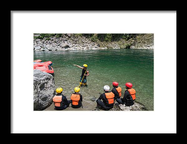 Safety Framed Print featuring the photograph Small group of men and women preparing to go white water river rafting #1 by Tdub303