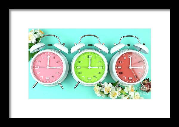 Alarm Framed Print featuring the photograph Springtime Daylight Saving Time Clocks #1 by Milleflore Images