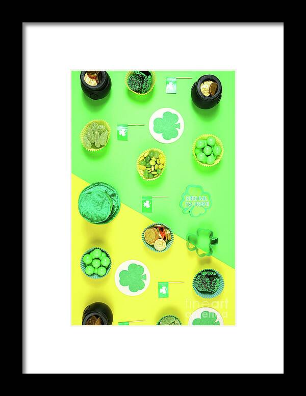 St Patrick Framed Print featuring the photograph St Patrick's Day flat lay with chocolate coins, leprechaun hat and shamrocks. #1 by Milleflore Images