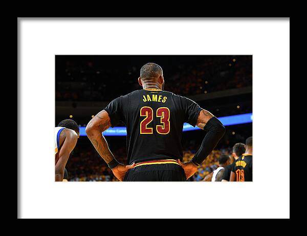 Lebron James Framed Print featuring the photograph Stephen Curry and Lebron James by Jesse D. Garrabrant