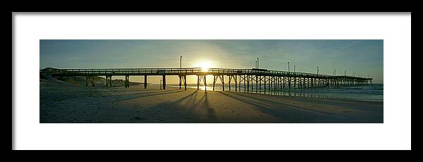 Beach Scene Framed Print featuring the photograph Sunrise at the Jolly Roger Pier #1 by Mike McGlothlen