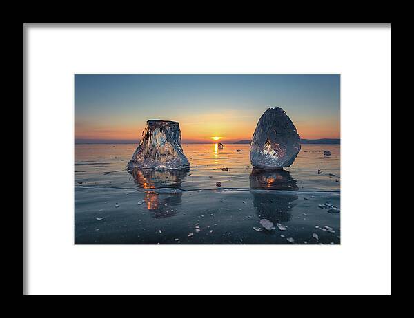 Ice Framed Print featuring the photograph Sunset on frozen Lake Baikal #1 by Mikhail Kokhanchikov