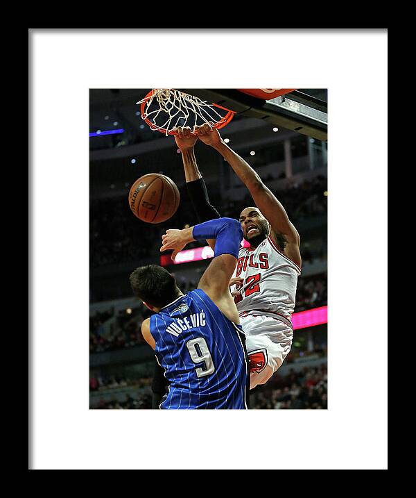 Chicago Bulls Framed Print featuring the photograph Taj Gibson #1 by Jonathan Daniel