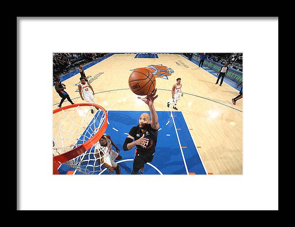 Playoffs Framed Print featuring the photograph Taj Gibson by Nathaniel S. Butler