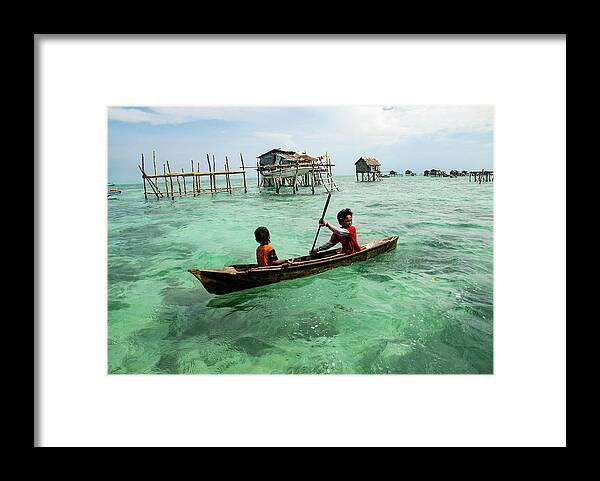 Sea Framed Print featuring the photograph Neptune's Children - Sea Gypsy Village, Sabah. Malaysian Borneo by Earth And Spirit