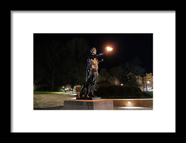 University Of Tennessee At Night Framed Print featuring the photograph Torchbearer statue at the University of Tennessee at night #1 by Eldon McGraw