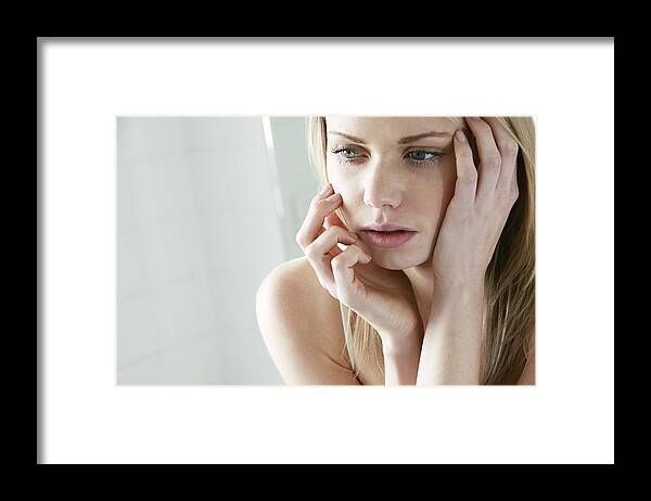 People Framed Print featuring the photograph Upset young woman #1 by Mauro Fermariello