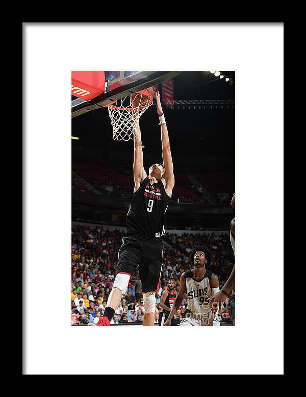 Nba Pro Basketball Framed Print featuring the photograph Zhou Qi by Garrett Ellwood
