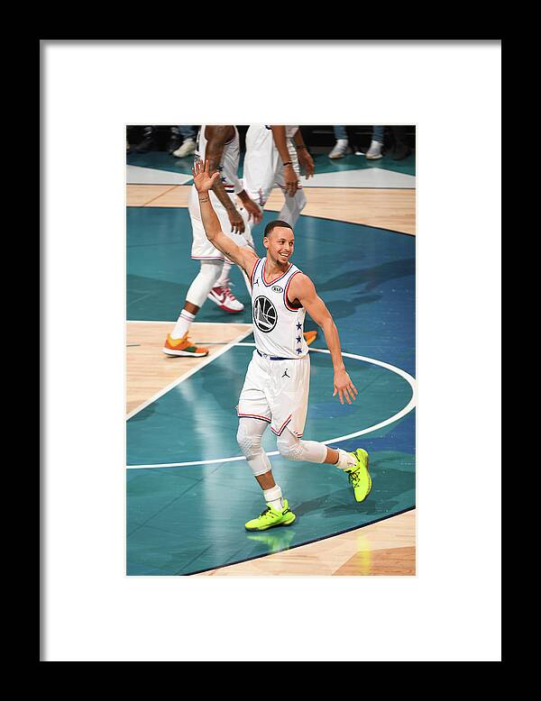 Nba Pro Basketball Framed Print featuring the photograph Stephen Curry by Garrett Ellwood