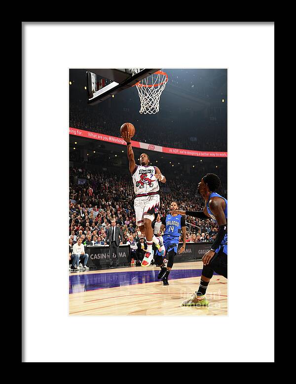 Nba Pro Basketball Framed Print featuring the photograph Kyle Lowry by Ron Turenne