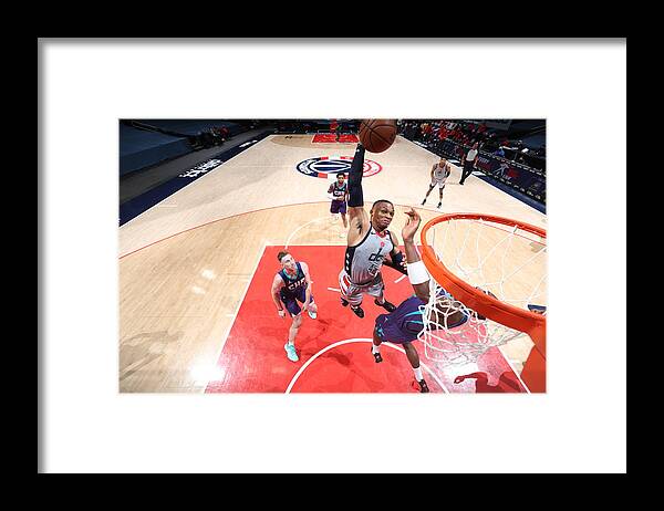 Russell Westbrook Framed Print featuring the photograph Russell Westbrook by Ned Dishman