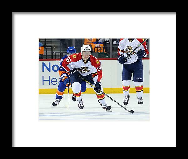 Playoffs Framed Print featuring the photograph Florida Panthers v New York Islanders - Game Six #16 by Bruce Bennett