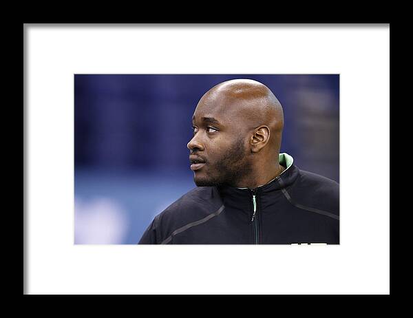 People Framed Print featuring the photograph NFL Combine - Day 3 #16 by Joe Robbins