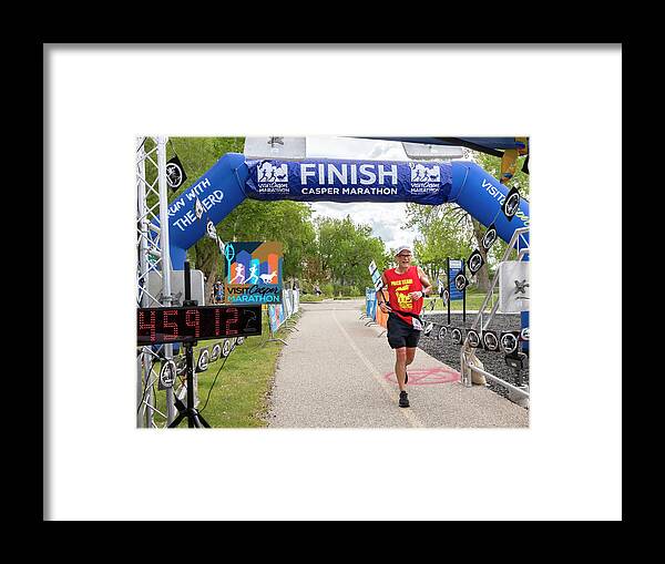 Casper Marathon 2022 Framed Print featuring the photograph Marathon by Laura Terriere