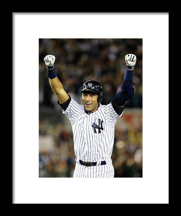 Ninth Inning Framed Print featuring the photograph Derek Jeter #19 by Al Bello