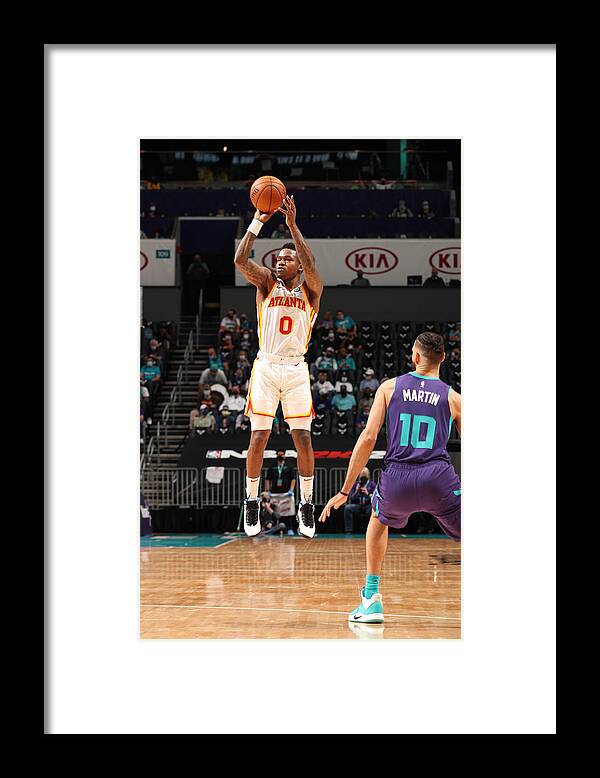 Brandon Goodwin Framed Print featuring the photograph Atlanta Hawks v Charlotte Hornets by Kent Smith