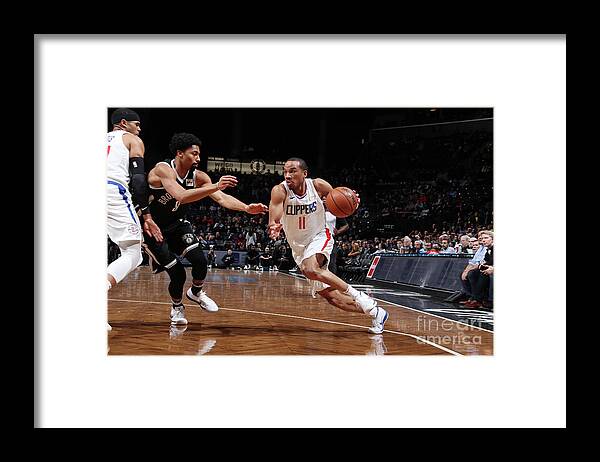 Avery Bradley Framed Print featuring the photograph Avery Bradley by Nathaniel S. Butler