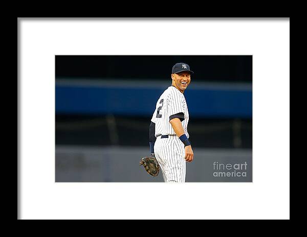 People Framed Print featuring the photograph Derek Jeter by Mike Stobe
