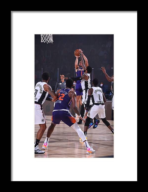 Devin Booker Framed Print featuring the photograph Devin Booker by Bill Baptist