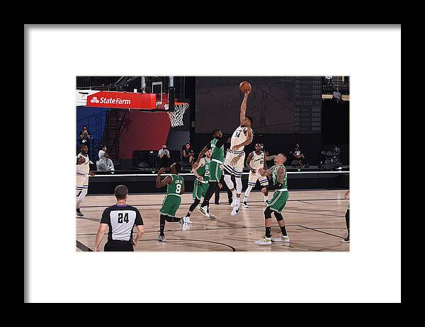 Nba Pro Basketball Framed Print featuring the photograph Giannis Antetokounmpo by Garrett Ellwood