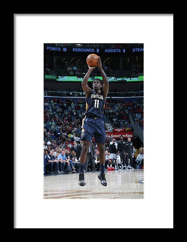 Jrue Holiday Framed Print featuring the photograph Jrue Holiday by Layne Murdoch