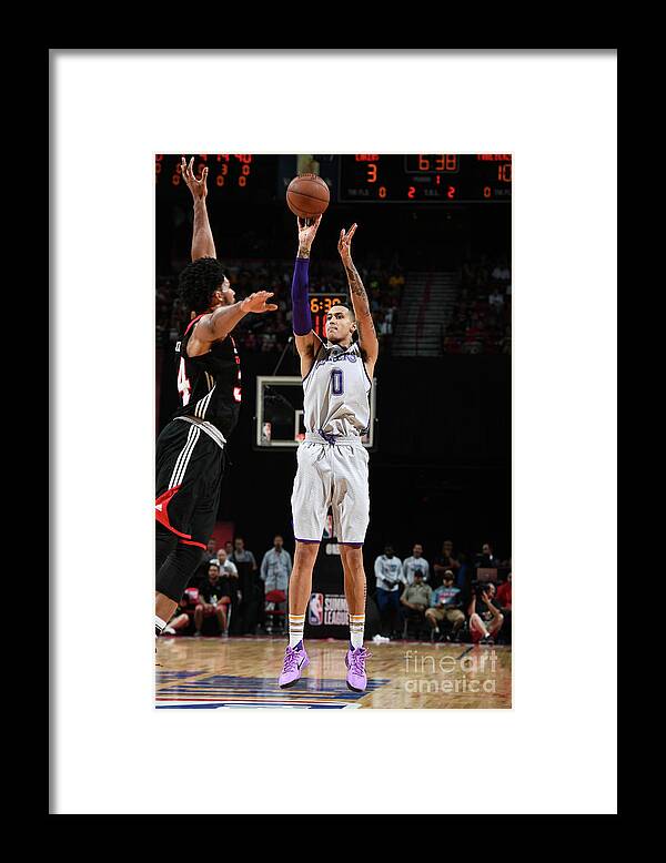 Nba Pro Basketball Framed Print featuring the photograph Kyle Kuzma by Garrett Ellwood