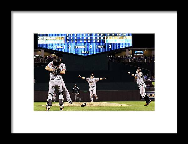 People Framed Print featuring the photograph Madison Bumgarner and Buster Posey by Jamie Squire