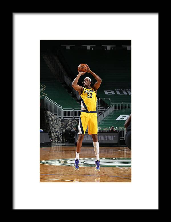 Nba Pro Basketball Framed Print featuring the photograph Myles Turner by Gary Dineen