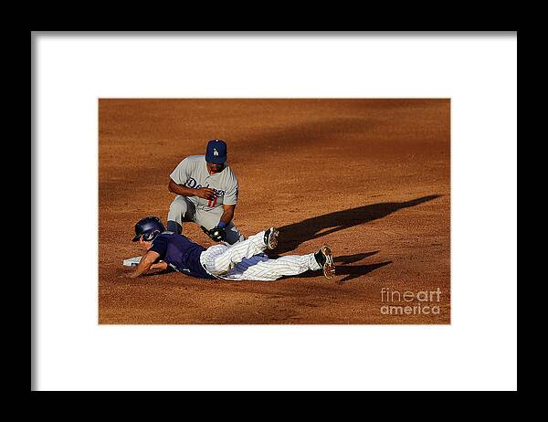 Game Two Framed Print featuring the photograph Nick Hundley and Jimmy Rollins by Doug Pensinger