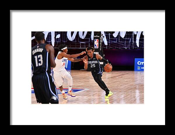 Nba Pro Basketball Framed Print featuring the photograph Orlando Magic v Los Angeles Clippers by Jesse D. Garrabrant