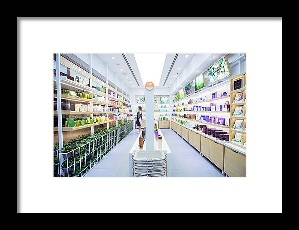 Retail Framed Print featuring the photograph Retail of Amorepacific Corp. Brands as South Korea's Biggest Cosmetics Makers Revamps Product Lineup by Bloomberg