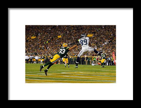 Green Bay Framed Print featuring the photograph Seattle Seahawks v Green Bay Packers #2 by Maddie Meyer