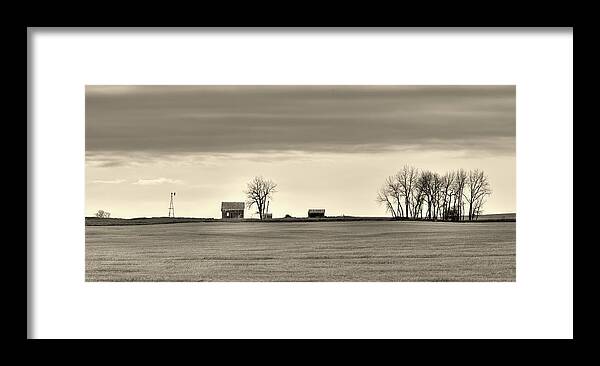Farm Framed Print featuring the photograph The Vast Forgotten - Farmhouse on the vast ND prairie by Peter Herman