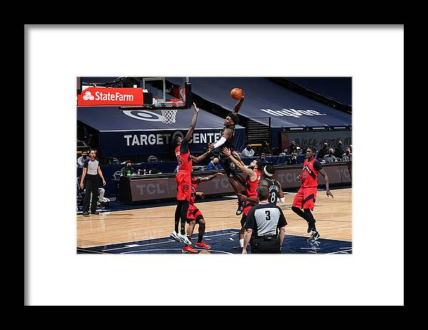 Nba Pro Basketball Framed Print featuring the photograph Toronto Raptors v Minnesota Timberwolves by David Sherman