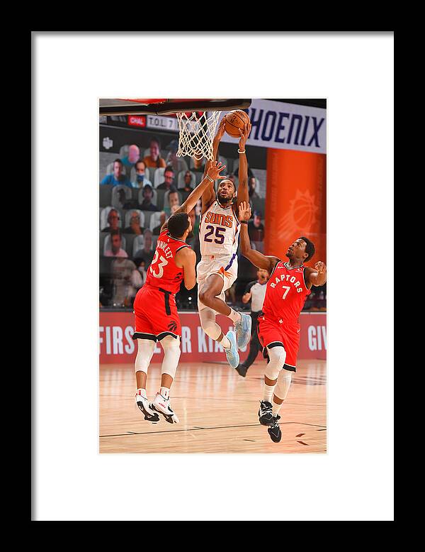 Nba Pro Basketball Framed Print featuring the photograph Toronto Raptors v Phoenix Suns by Bill Baptist