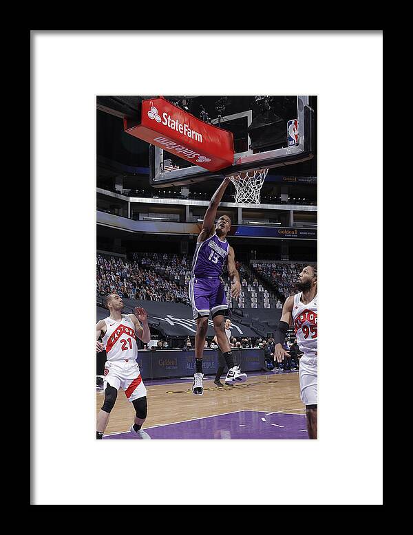 Nba Pro Basketball Framed Print featuring the photograph Toronto Raptors v Sacramento Kings by Rocky Widner