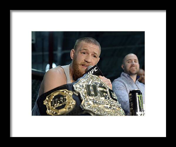 People Framed Print featuring the photograph UFC 196 McGregor vs. Diaz Press Conference #2 by Kevork Djansezian