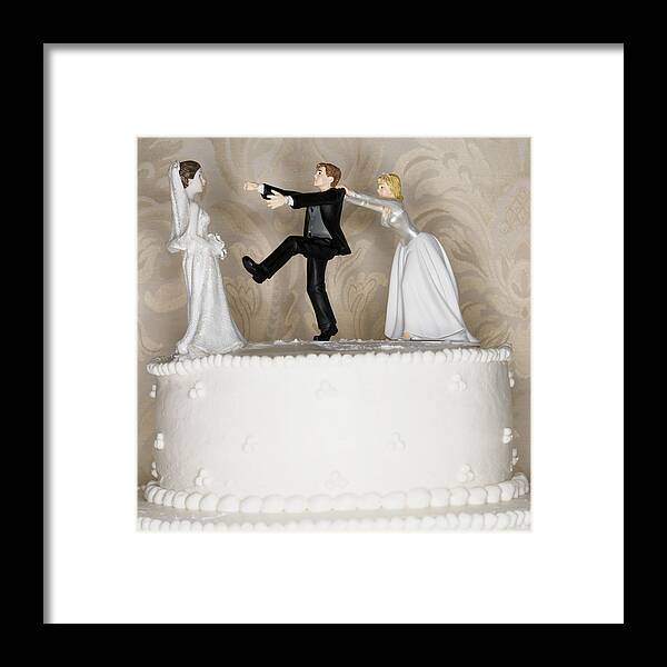 Groom Framed Print featuring the photograph Wedding cake visual metaphor with figurine cake toppers #2 by Mike Kemp