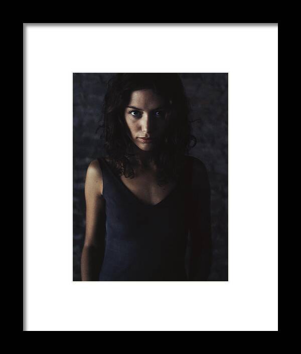 Caucasian Ethnicity Framed Print featuring the photograph Woman looking into camera, portrait. #2 by Matthieu Spohn