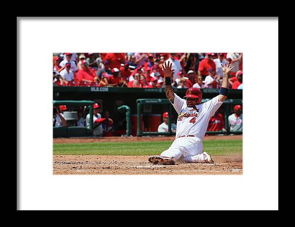 St. Louis Cardinals Framed Print featuring the photograph Yadier Molina by Dilip Vishwanat