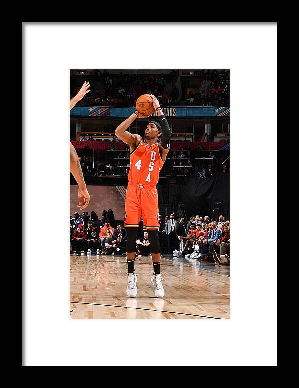 Devonte' Graham Framed Print featuring the photograph 2020 NBA All-Star - Rising Stars Game by Jesse D. Garrabrant