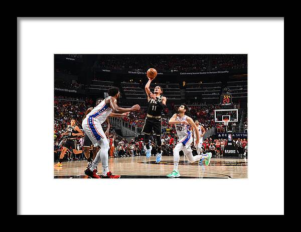 Trae Young Framed Print featuring the photograph 2021 NBA Playoffs - Philadelphia 76ers v Atlanta Hawks by Jesse D. Garrabrant