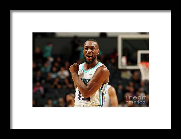 Kemba Walker Framed Print featuring the photograph Kemba Walker #23 by Kent Smith