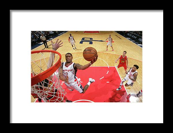 Bradley Beal Framed Print featuring the photograph Bradley Beal by Ned Dishman