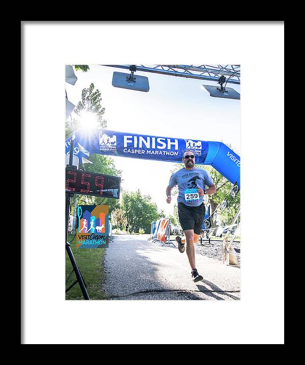 Casper Marathon 2022 Framed Print featuring the photograph Marathon by Laura Terriere