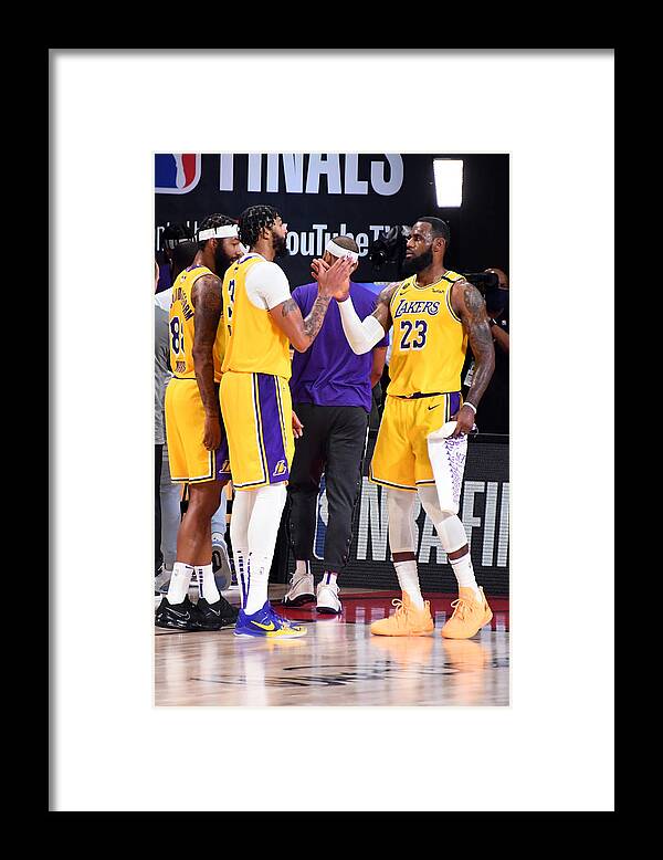Anthony Davis Framed Print featuring the photograph Anthony Davis and Lebron James by Andrew D. Bernstein