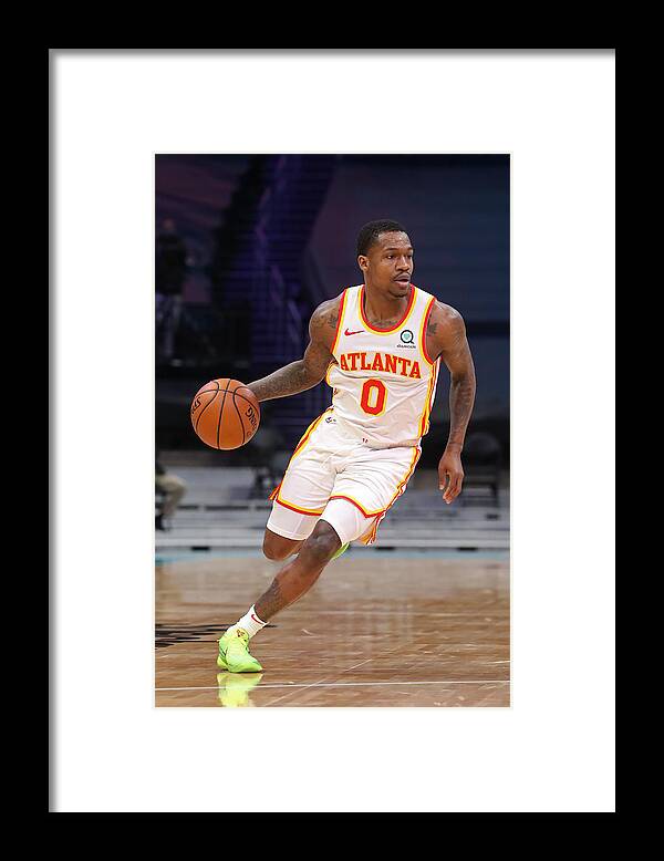 Brandon Goodwin Framed Print featuring the photograph Atlanta Hawks v Charlotte Hornets #3 by Brock Williams-Smith