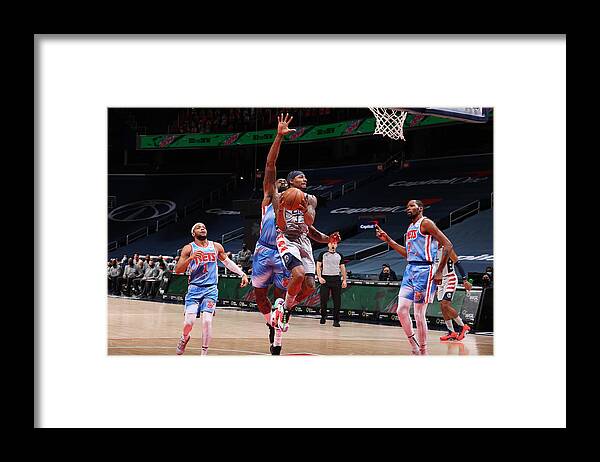 Bradley Beal Framed Print featuring the photograph Bradley Beal by Stephen Gosling
