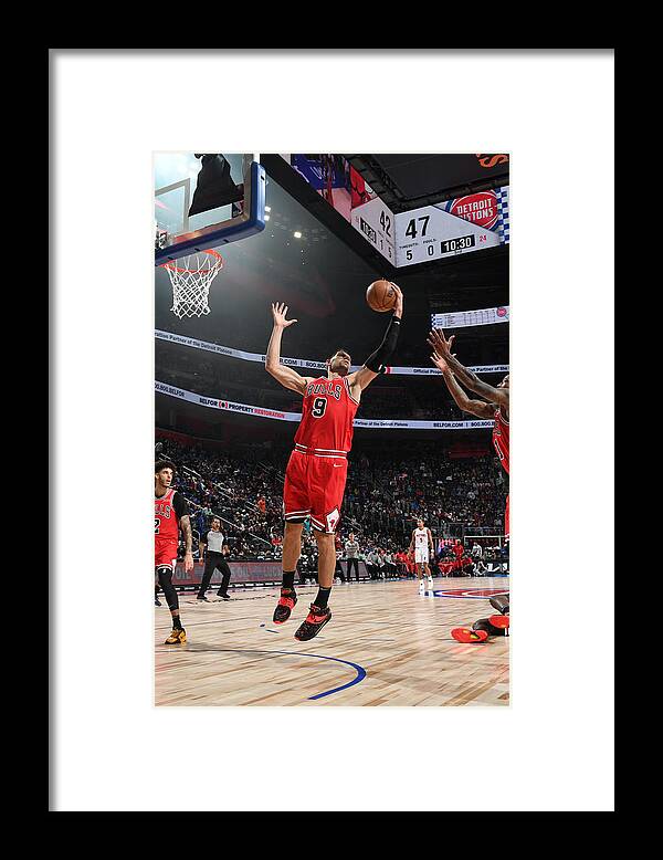 Nikola Vucevic Framed Print featuring the photograph Chicago Bulls v Detroit Pistons #3 by Chris Schwegler
